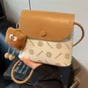 Bolsos Pequeños al por Mayor para Mujer 2025 Nuevo Estilo Invierno Bolso Cubo de Moda de Alta Gama Bolso Cruzado Versátil Casual de Gran Capacidad