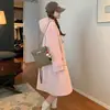Abrigo de lana de longitud media con capucha y bolsillo de botón de cuerno rosa transfronterizo para mujer, abrigo petite estilo universitario de otoño e invierno, moderno