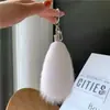 Llavero de coche de piel de zorro, colgante para bolso de piel auténtica, adorno colgante de peluche, decoración de cola linda, accesorio de llavero personalizado y elegante