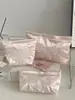 Bolsa de Cosméticos con Lazo Perlado Rosa Transfronterizo Linda Femenina Alta Calidad Gran Capacidad Bordada Satén de Seda Bolsa de Almacenamiento