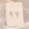 Pendientes antiguos de dos corazones con doble clic y diseño francés Cat Ning, sencillos, asimétricos y con circonitas brillantes en forma de corazón.