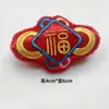 Festival de Primavera Año Nuevo Muñeco Pequeño Relleno de Algodón Accesorios Decorativos Bolsa de la Fortuna Yuanbao Gato de la Suerte Broche Zapatos y Calcetines Accesorios de Ropa