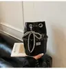 Bolsa de Teléfono Móvil Ligera Nueva Primavera 2025 Estilo Pequeño Fragante Cadena de Rombo Bolso de Hombro Axila Bolso Cruzado