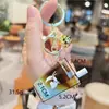 Luckin Coffee Mini Naranja C Americano Botella Arena Líquida Llavero Tendencia de Verano Colgante para Bolso de Pareja Regalo
