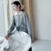 Nueva colección de otoño para niñas: Conjunto de cárdigan gris de manga larga con cuello de muñeca estilo francés y falda blanca floral, un vestido largo versátil para primavera y otoño