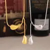 Collar con borlas de gota de agua, diseño de lujo, ligero y apilado, con baño de titanio y acero de 18 quilates, para Europa y Estados Unidos.