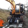 Usar excavadora para reacondicionar máquina cambiadora de traviesas de ferrocarril equipo de mantenimiento ferroviario máquina cambiadora de traviesas máquina de ganchos máquina cambiadora de traviesas