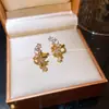 Super Brilhante Zircônia Estrela Ear Cuff Luxo Leve High-End Moda Simples Exquisito Clipe de Cartilagem da Orelha Senso de Design Brinco de Nicho para Mulheres