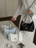 Bolso de Axila de Alta Apariencia a la Moda para Mujer 2026 Nuevo Estilo Chic Relajado Bolso de Hombro Cadena Tipo Dumpling para el Viaje al Trabajo