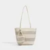 Bolso de axila tejido de estilo casual para mujer, nuevo modelo 2026, bolso de playa para vacaciones junto al mar, bolso tote de paja de un solo hombro de gran capacidad