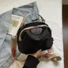 Nova Bolsa de Ombro Casual Leve Versátil de Nylon da Moda para Mulheres, Design Primavera e Verão, Bolsa de Mão e Bolsa Transversal Elegantes para o Dia a Dia