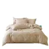 Nuevo juego de cuatro piezas de jacquard hueco de algodón-lino Tencel de alta precisión y lujo sutil, juego de ropa de cama premium para regalo con funda de edredón