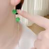Exquisitos Aretes de Gota de Agua Verde para Mujer 2025 Nuevos Aretes Versátiles de Moda Retro de Alta Gama con Imitación de Ojo de Gato
