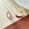 Moda Europeia e Americana Transfronteiriça Design Único Dupla Face Vazado Coração de Pérola Ear Cuffs para Mulheres, Brincos Simples de Luxo Leve Personalizados