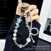 Lanyard de Celular Estilo Ins de Influenciador de Tiktok de Alto Valor Corrente de Celular com Laço Corrente de Contas Criativa Versátil Presente Atacado