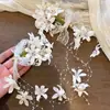 Pinza para el pelo de flor de lirio del valle, simulación de foto de viaje, para mujer, ambiente de bosque, súper de hadas, con borla, pinza lateral