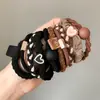 Cuerda para el Cabello Altamente Elástica y Duradera, Cuerda para el Cabello Simple y de Alta Gama, Nueva Goma Elástica 2025, Lazo para el Cabello de Mujer, Accesorio para la Cabeza Popular