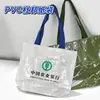 Sacola de papel DuPont com logo impresso personalizado, bolsa tote com zíper de ombro único e transversal, bolsa de mão para presente em estoque, bolsa à prova d'água para celular