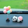 Adornos para coche en línea rojo caricatura lindo Q juego trasero muñeca consola central del coche juguete de descompresión decoraciones de animales