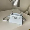 Bolso de Mano Pequeño con Patrón de Piedra Degradada para Mujer 2026 Nuevo Versátil Bolso Kelly de Mano Primavera de Gama Alta Versátil Bolso Cruzado