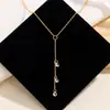 Buscar Collar Largo Colgante LightLong Plata de Ley S925 Chapado en Oro Zirconia para Mujer, Muy Brillante, Cadena de Clavícula Simple y Exquisita