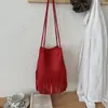 Bolso cubeta tejido con patrón de flecos de nicho transfronterizo, bolso de hombro casual nuevo 2026, bolso cruzado de moda de comercio exterior