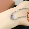Venta al por mayor de fábrica explosiones pulsera de tanzanita natural plata S925 incrustada piedra principal 4*6 vendiendo Europa y Estados Unidos una generación de cabello