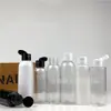 En Stock 100 ml120ml150ml botella de plástico con tapa abatible PET transparente sub-botella cosmética botella de muestra de loción