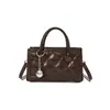 Bolso de mano versátil estilo Chanel de charol, nuevo para otoño 2026, de alta gama, pequeño cuadrado para llevar al hombro o cruzado