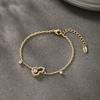 Xuping Nueva Moda Aleación Galvanizada Color Oro 14K Piedra Artificial Gota Hueca Pulsera Estilo Único Accesorio de Mano