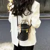 Bolsas Femininas de Nicho 2025 Novo Modelo Bolsa de Mão Cilíndrica de Alto Padrão Bolsa Saco da Moda Bolsa Transversal Popular Versátil
