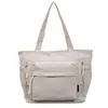 Bolsa tote grande capacidade estilo coreano, perfeita para estudantes usarem na escola ou no trajeto, uma bolsa de mão simples e fashion que pode ser carregada na mão ou usada no ombro