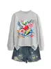Amazon eBay Estación Independiente Moda Casual Mujer Manzana Rosa Flor Lápiz Libro Temperamento Cuello Redondo Sudadera Comercio Exterior