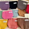 Bolsa de almacenamiento de cosméticos de pana lisa bolsa de almacenamiento de viaje bolsa de almacenamiento diario bolsa de cosméticos simple venta al por mayor de fábrica