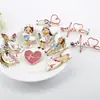 Broche Creativo de Dibujos Animados Europeos y Americanos Estetoscopio Estéreo Doctor Enfermera Forma de Corazón Electrocardiograma Gota de Aceite Insignia Pecho Al por Mayor