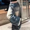 Pantalones de mezclilla estilo retro americano transfronterizos, nueva colección otoño/invierno, con lavado pesado y acabado desgastado, corte holgado y diseño de pierna ancha para hombres y mujeres