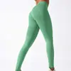 Pantalones de yoga de punto sin costuras de color liso melocotón de cintura alta con efecto levantamiento de glúteos, transfronterizos europeos y americanos, para deportes, correr y fitness