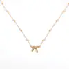 Collar de acero inoxidable dorado estilo ins europeo nuevo Collar creativo de nudo de lazo de lujo ligero para mujer nicho versátil