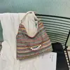 Bolsa Mochila de Design Exclusivo Tecida para Pedidos Internacionais para Mulheres 2026 Novo Modelo Grande Capacidade Versátil Moda Bolsa de Ombro Tote