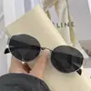 Gafas de sol estilo Hong Kong para mujer de alta gama 2026 nuevas europeas y americanas de metal con montura pequeña ovalada retro color canela