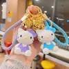 Lindo Llavero de Nudo de Lazo Gato Kt Figura de Resina Hello Kitty Colgante de Cuerda Trenzada Encanto Versátil de Bolsa de Dibujos Animados
