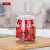 En stock al por mayor botella de pudín botella de vidrio botella de mermelada botella de yogur al por mayor vidrio transparente engrosado con tapa sellada