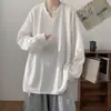 Camisa de manga larga texturizada para hombre, nuevo estilo otoño e invierno 2024, casual y elegante, top base de ajuste holgado color blanco