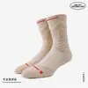 Los calcetines de baloncesto profesionales Dou Niu 3.0, con propiedades antibacterianas y resistentes al olor, están diseñados para correr, ofreciendo durabilidad, absorción de impactos y una suela gruesa tipo toalla para mayor comodidad durante las actividades deportivas.