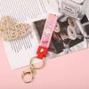 Conejito Blanco Pequeño en Forma de Corazón Goma Suave Llavero Transparente Correa de Mano Botella de Arena Líquida Muñeco Pequeños Accesorios Venta al por Mayor Juguete para Llave de Coche