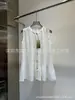 Fábrica Nanyou de Shenzhen2025 Nuevo Importado Triacetato Francés Top Sin Mangas Elegante Camisa Plisada
