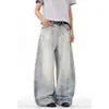 Moda transfronteriza estilo Hong Kong moderno para hombre y mujer verano nuevo 2026 jeans rotos personalizados hip-hop tendencia ins calle alta
