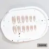 24 PIEZAS Colección de Arte para Uñas Bestseller Transfronterizo Navidad Halloween Flor Uñas Portátiles Ojo de Gato Halloween Piezas de Uñas Portátiles