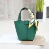 Camada Superior de Textura Avançada Couro Bovino Moda Verão 2025 Novo Estilo Bolsa Transversal Centenas de Estilos Bolsa de Balde Portátil de Nicho da Moda