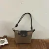Bolso Retro de Color Sólido de un Solo Hombro 2026 Nuevo Pequeño de Nicho Versátil para Viajes Diarios Bolso Cruzado Correa de Moda Sensación de Lujo Bolso de Hombro